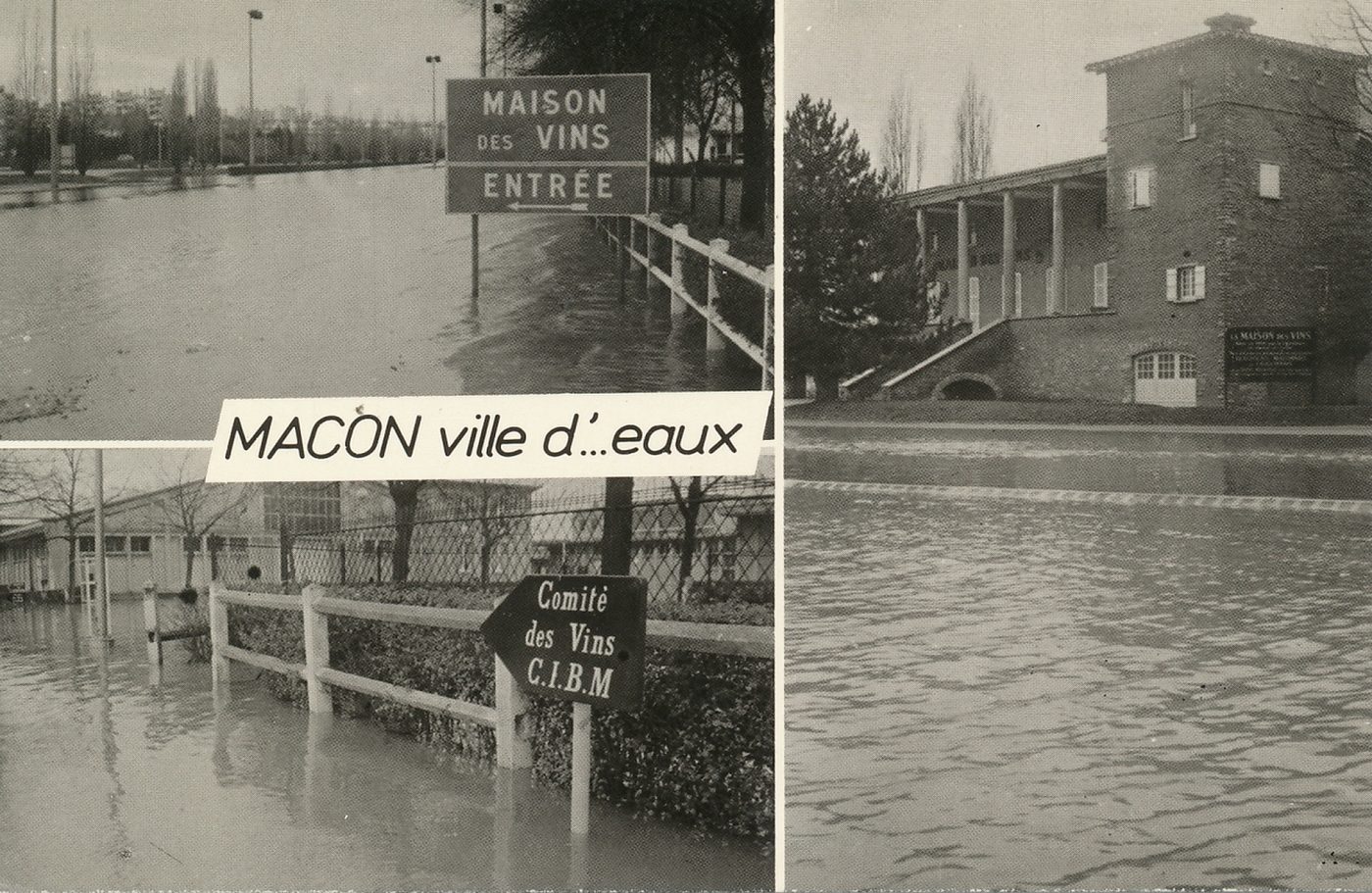 Mâcon ville d'eaux. Maison des vins. Comité des vins C.I.B.M. Crue de la Saône. Décembre 1981. Maison et Comité des vins (sans eau). Mais...difficile d'aller boire un pot sans se mouiller... Historique des crues. 1403 et 1408 furent des années de fortes crues. 1423, 29 octobre. Catastrophe ! la grande arche et la chapelle Saint-Nicolas, qui servait de guet, s'effondrèrent dans les flots d'une montée soudaine des eaux. 1476 et 1501. De nouveau Mascon connait l'inondation. Depuis 1601 (traité de Lyon-Henri IV), la Bresse est devenue française et la Saône ne joue plus le rôle de frontière.